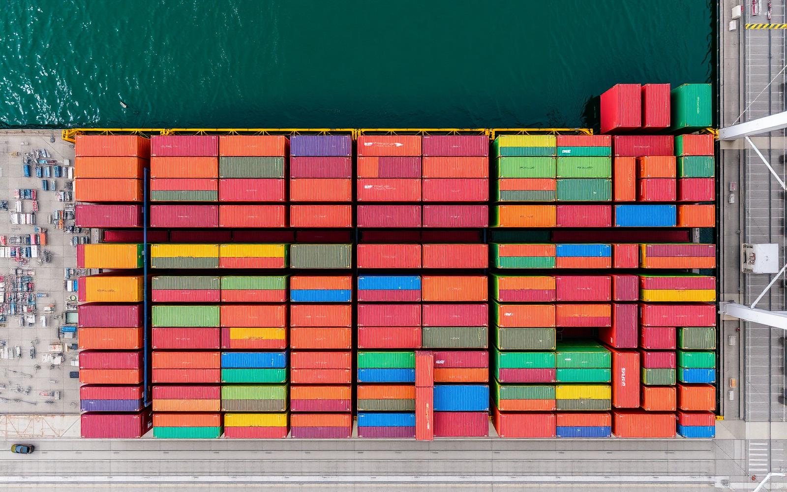 Aerial view of stacked shipping containers at the Port of Long Beach